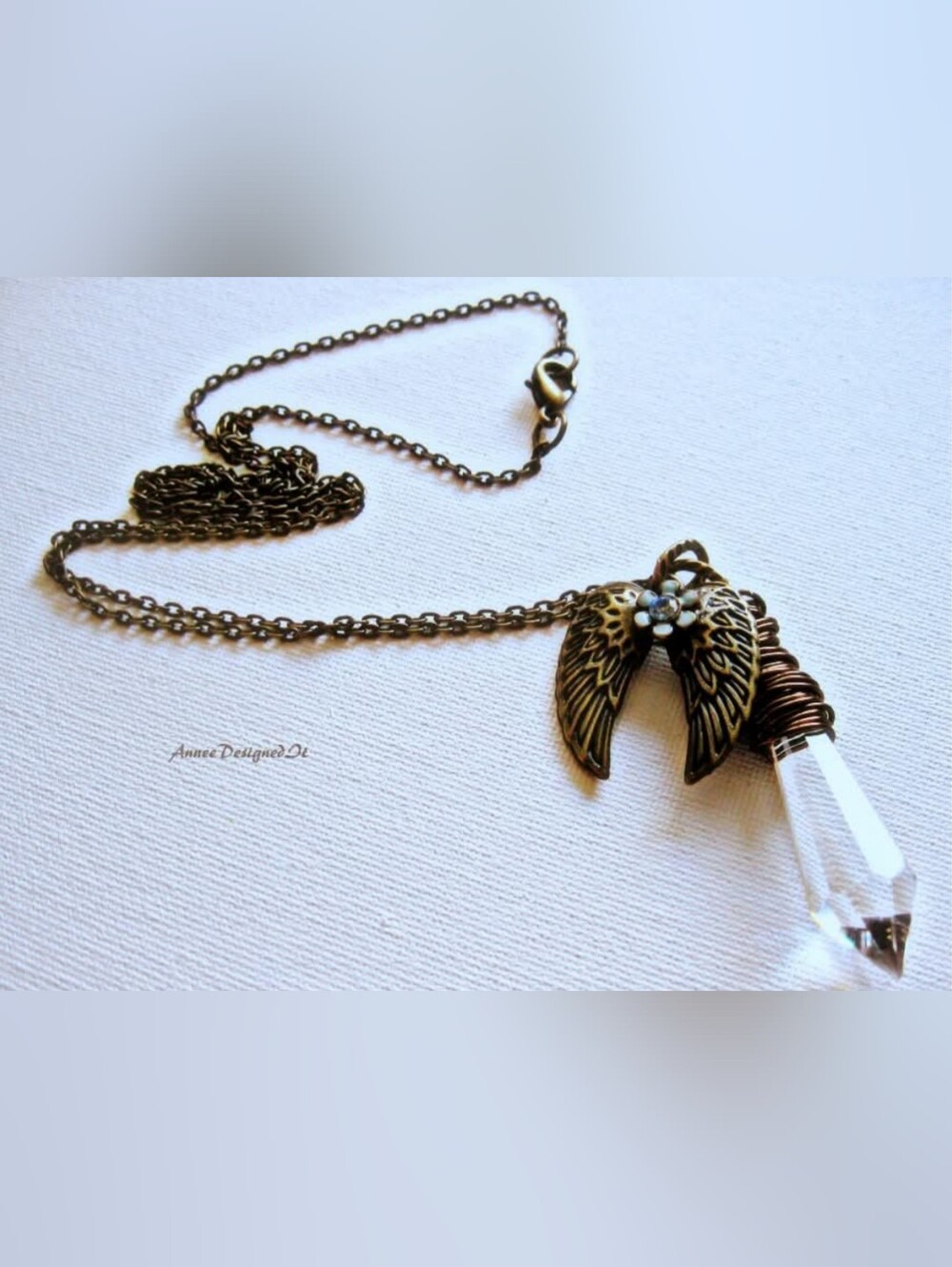 Antique Bronze Angel Wing Necklace with Rhinestone Accent